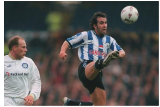 After one season when Wednesday strayed from the familiar blue and white stripes, the club opted to return to a more traditional look - although for this period, donned black shorts and socks. It was the era of Paolo Di Canio and Benito Carbone. It was also the second season of the club's new crest adorning its strips,  which saw the Owls ditch the iconic owl 'animal badge' that had been used since the early 70s.