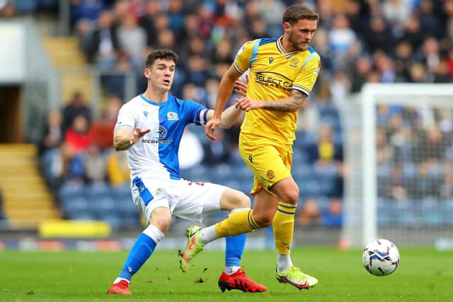 Two former Sheffield United targets, Blackburn Rovers' Darragh Lenihan (left) and Reading's John Swift (right), battle for the ball: Tim Markland/PA Wire.