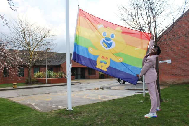 Dr Ronx helped raise a Rainbow Theo flag to fly proudly over the Becton Centre.