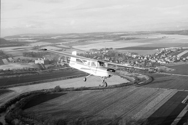 A member of Lothians Flying Club over Turnhouse Airport in December 1963.