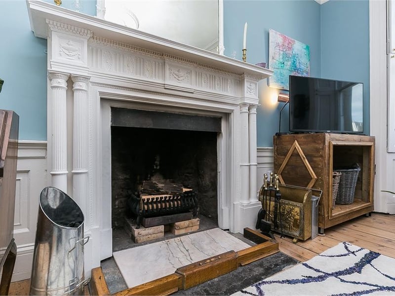 Feature fireplace in living room.