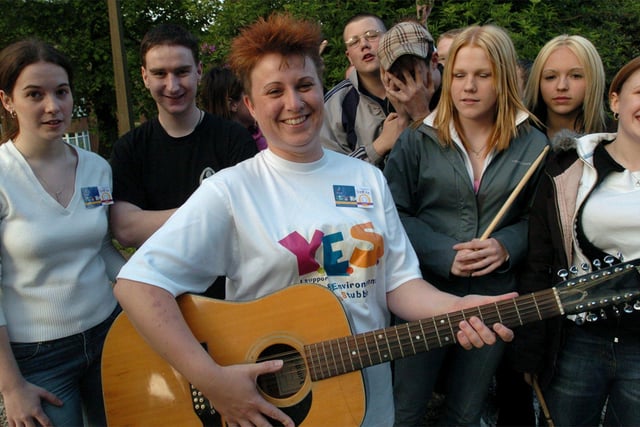Youth leader Louise Webster (with guitar) with members of the Sunrise Youth Club, at St John's Church, Deepcar in  2004