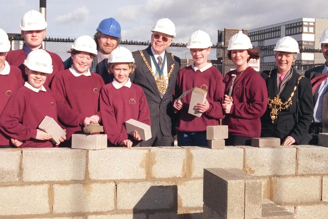 Bricklaying at Myrtle Springs in 2000. Also pictured are the deputy headteacher Mr David Moxon, The Lord Mayor of Sheffield Councillor Trevor Bagshaw, with Mrs Margaret Bagshaw and Mr Paul Holmes of the Sheffield Education Department.