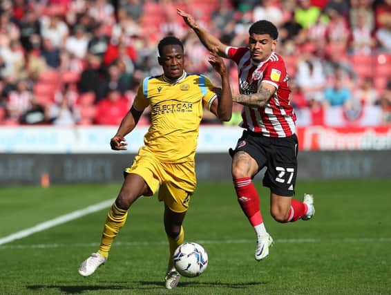 Baba Rahman of Reading and Morgan Gibbs-White of Sheffield United battle for possession: Simon Bellis / Sportimage