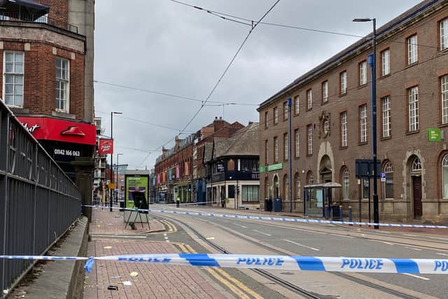 West Street is cordoned off after a man was stabbed.