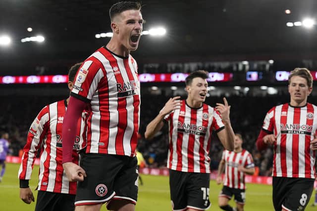 Ciaran Clark celebrates his first goal for Sheffield United: Andrew Yates / Sportimage
