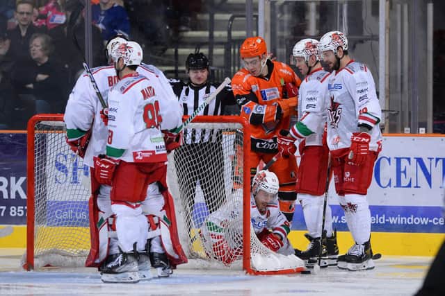 Mason Mitchell surrounded v Cardiff, picture: Dean Woolley