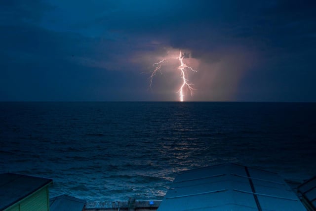 Young blood category winner -A lightning bolt over Walton on the Naze, Essex. See SWNS copy SWCAwildlife:  A wildlife photography competition has picked its stunning winner and runner-up photos - including fighting foxes and an amazing close-up photo of dragonfly wings. Over 800 photos were submitted to the Essex Wildlife Trust Photograph Competition 2020, with more than 1,800 public votes cast to decide the six category winners, and six runners-up. The competition also announced 24 stunning 'Highly Commended' photos - including a striking shot of two foxes in the midst of a fierce brawl in Pitsea, Essex, their teeth bared as they snapped and clawed at one another.
