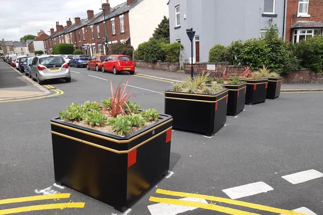 Planters blocking a road in Crookes