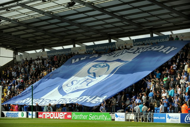 Wednesday supporters fly the flag at Colchester United in October 2010.