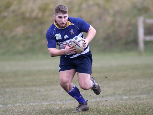 A Mansfield player finds space during a match against Buxton.
