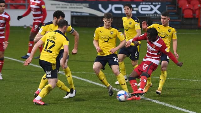 Taylor Richards fires in Doncaster Rovers' third goal against Oxford United. Picture: Andrew Roe/AHPIX
