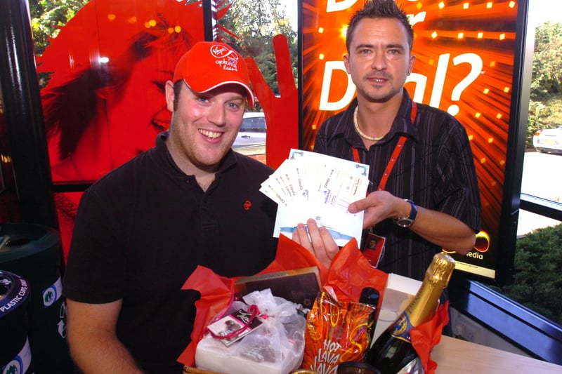Staff at Virgin Media, Evolution House, Chippingham Street, Attercliffe raised funds for the South Yorkshire Flood Disaster Relief Fund in 2007. Organiser Daniel Firth, left, presents Hillsborough flood victim Paul Askwith with a hamper and £200 in-store vouchers to help him replace items damaged at his home