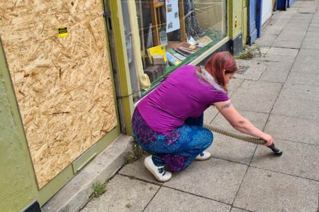 Two Sheffield shops less than a mile apart suffered break-ins in the early hours on Sunday night. Anwen Fryer cleared glass off the pavement outside her shop, Airy Fairy, to make sure no digs were injured by broken glass
