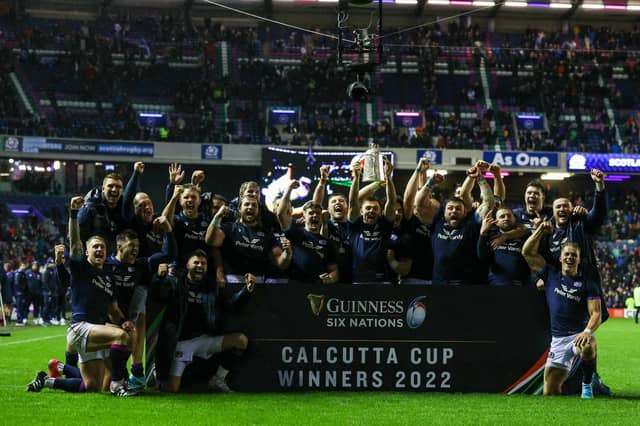 Scotland's players celebrate a famous 20-17 win over England at BT Murrayfield, retaining the Calcutta Cup in the process.