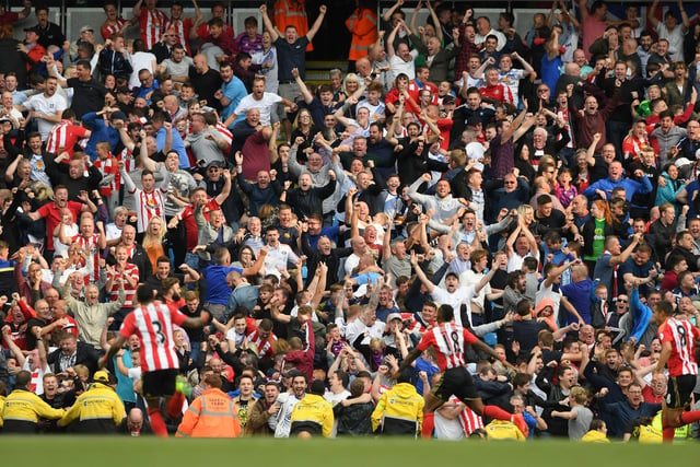 Sunderland fans celebrate Jermain Defoe goal during the Premier League match between Manchester City and Sunderland at the Etihad Stadium.