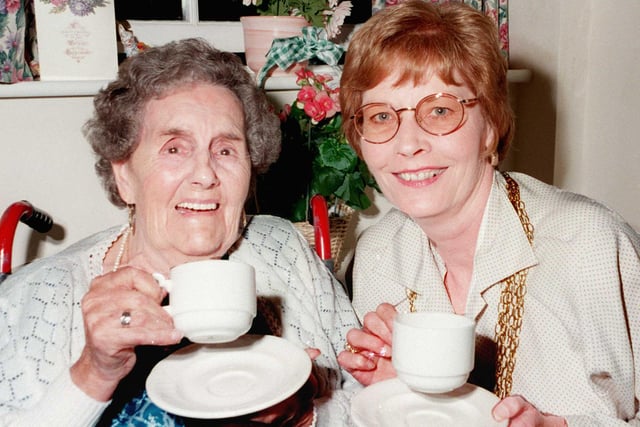 At Owston Court Lodge Owston Village residential home in 1998 where 100 yrs old Mrs Emma Law takes tea with the Mayor of Doncaster Cllr Yvonne Woodcock