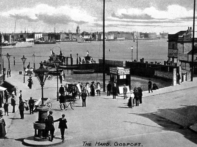 The Hard at Gosport looking across Portsmouth Harbour Circa 1905. To the left is the Ferry Ticket Office. In the foreground is the Gambler drinking fountain.