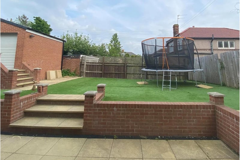 This property includes a big, spacious garden for the whole family to enjoy.