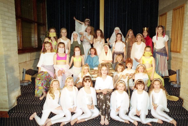 Members of the Rowena Thompson School of Dance who were in the cast of a musical Nativity play. They took presents to the Fulwell Methodist Church hall for the Echo's Toy Sack Appeal in 1991.