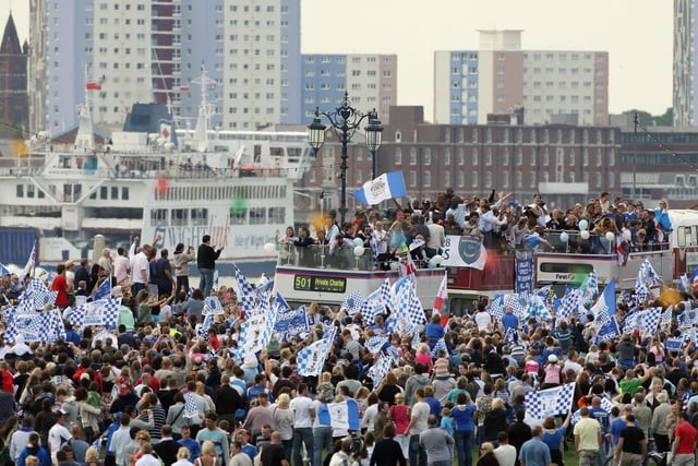 Portsmouth fans celebrate as their team arrive in a open top bus as part of their victory parade at Southsea Common following their win in the FA Cup Final 2008 on May 18 2008 in Portsmouth, England. Picture: Matt Cardy/Getty Images