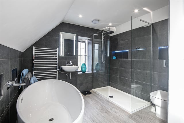 There is no door seperating the bedroom space from the en-suite, making the entire suite open plan.