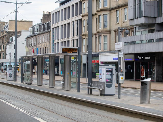 An empty tram stop on Princes Street.