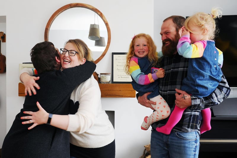 A moment to remember ... . Friend and neighbour, Moira Holland visits Angela Will and Philip Roder and their children Emmi Roder 4 and Eloisa Roder 2, indoors for the first time since lockdown.  (Pic: Michael Gillen)