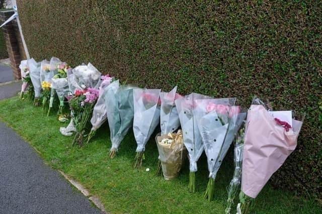 Floral tributes left to Bryan and Mary Andrews in Terrey Road, Totley, Sheffield, following their deaths on Sunday, November 27, 2022. Their son Duncan Andrews has admitted killing them. He pleaded guilty at Sheffield Crown Court on April 28 to two counts of manslaughter.