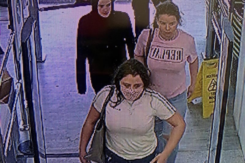 Sought by police after suspects entered store and left with concealed items of bedding