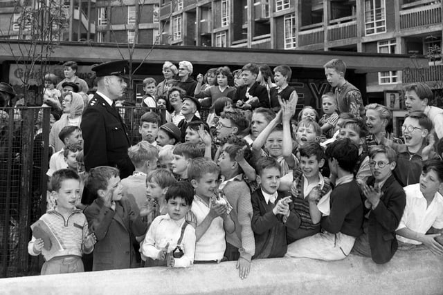 Children wait for the former Labour Leader, Hugh Gaitskell, to arrive for the official opening of the Park Hill Flats complex, Sheffield, on June 16, 1961