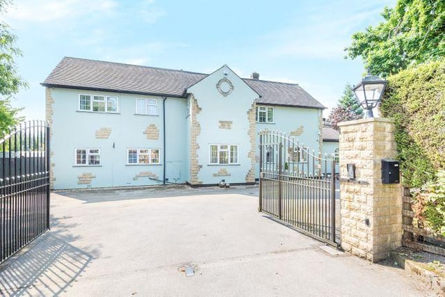 This equestrian home is set in approximately three and a half acres, with equestrian facilities and beautiful gardens