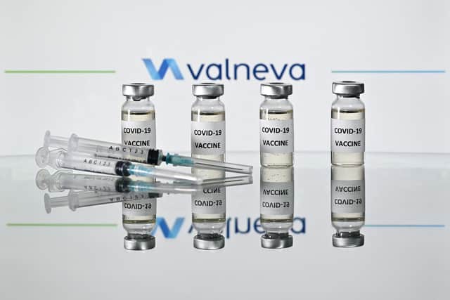 Vials with Covid-19 Vaccine stickers attached and syringes with the logo of French-Austrian vaccine firm Valneva on November 17, 2020. - Valneva announced on April 21, 2021 the launch of a Phase III clinical study, the last step before a marketing application, for its candidate vaccine against Covid 19. (Photo by JUSTIN TALLIS / AFP) (Photo by JUSTIN TALLIS/AFP via Getty Images)