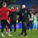 Wales goalkeeper Adam Davies celebrates with Rob Page after the final whistle following the FIFA World Cup Qualifier semi-final match at Cardiff City Stadium, Cardiff: Nick Potts/PA Wire.