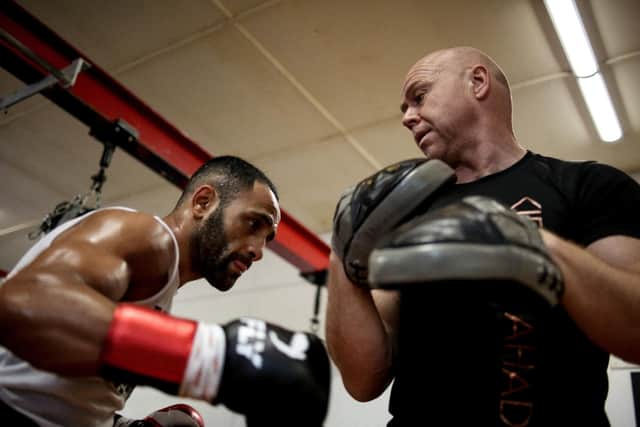 Dom with professional boxer Kid Galahad in his gym.
