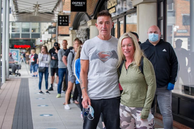 Tony Rothwell and Tina Holland outside Nike store.