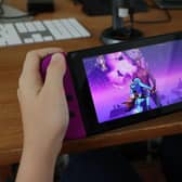 The Nintendo Switch is available in a variety of colours, including the purple and orange 'Fortnite edition' (Photo: Neilson Barnard/Getty Images)