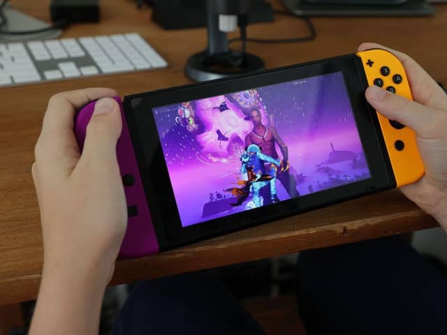 The Nintendo Switch is available in a variety of colours, including the purple and orange 'Fortnite edition' (Photo: Neilson Barnard/Getty Images)