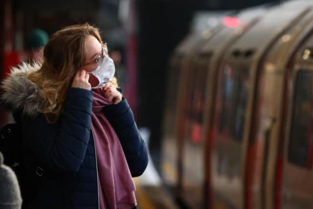 The Prime Minister has introduced new Covid rules on travelling, including wearing masks on public transport and taking PCR tests, amid fears over the new Omicron variant. Photo by ADRIAN DENNIS/AFP via Getty Images.