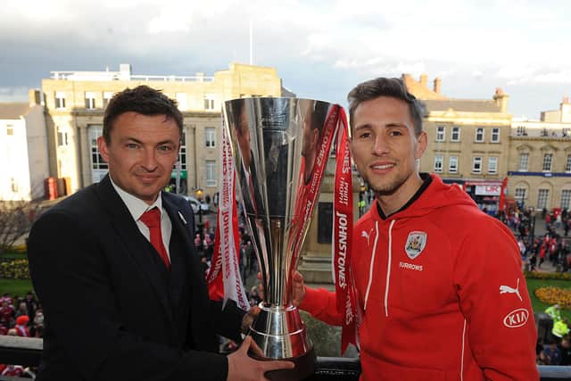 Paul Heckingbottom and Conor Hourihane after winning the Johnstone Paint Trophy with Barnsley