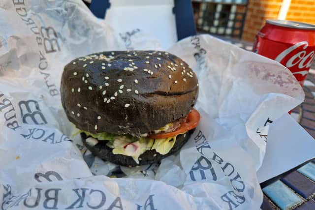 I tried the Walnut Burger, priced at £10.50. The crushed walnut and beef patty comes inside a black brioche bun, given its colour from charcoal, and a dusting of sesame seeds.