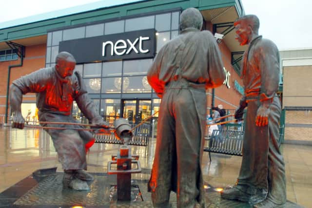 The steelmen statue when it moved to its new home outside Meadowhall
