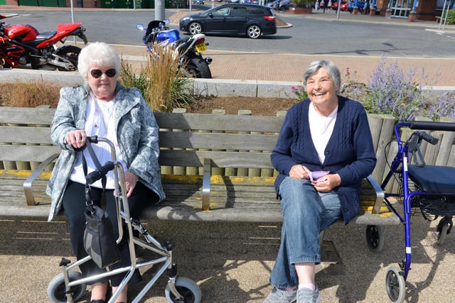 Friends Irene Atkinson and Ella Miller (R) catch up at Seaburn seafront.