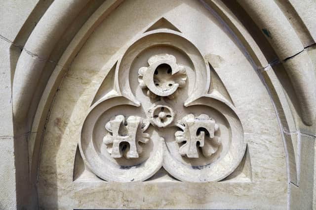 Charles Henry Firth's initials carved in stone.