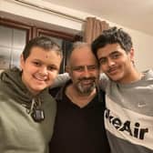 Qasem Fara, from Heeley, Sheffield, with his late brother Qayis, who died of bone cancer aged just 16, and their father Musheir El-Farra. Qasem and his father are stranded in Gaza.