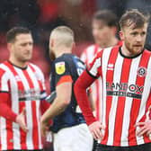 Tommy Doyle of Sheffield United reacts following the Sky Bet Championship between Sheffield United and Luton Town at Bramall Lane on March 11, 2023 in Sheffield, England. (Photo by Cameron Smith/Getty Images)