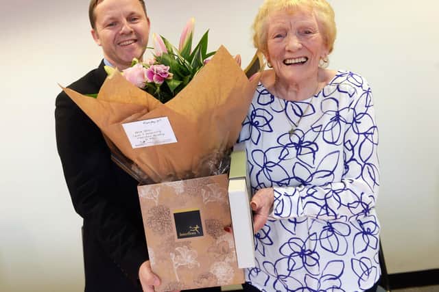 Anne Shaw is retiring as a Foster Carer after more than 40 years. Pictured at her leaving presentation with Paul Dempsey, Sheffield Council's Assistant Director for Children's Provider Services.
