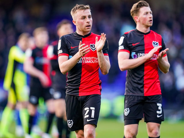 Joe Morrell and Denver Hume show their appreciation to the travelling Pompey fans