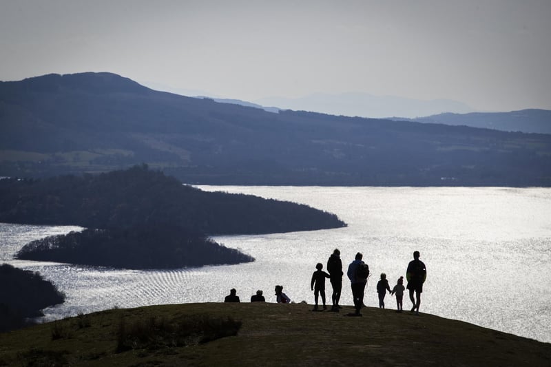 Another one of Scotland's routes - Loch Lomond to Lochgilphead  - made it into the study's top ten places to road trip around in the UK. The picture shows a family looking out across Loch Lomond from Conic Hill, near Balmaha.
