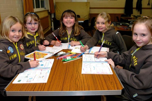 Florence Thompson, Claire Munday, Rachel Munday, Charlotte Talbot and Victoria Hibbert do some work on their workbooks  in 2007